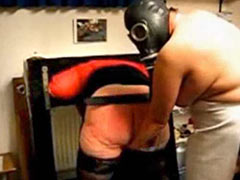 Corporal punishment in gas mask